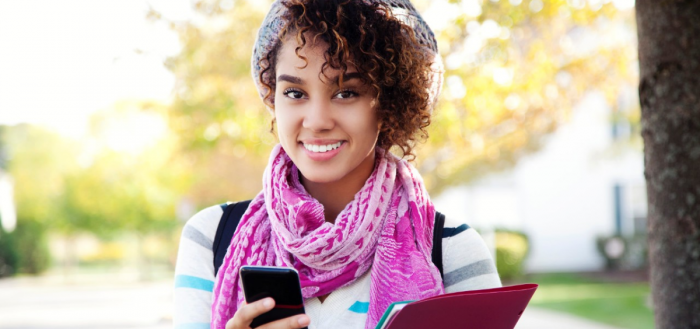 081313-national-college-apps-student-teen-woman-cell-phone-smart-phone-smiling-happy